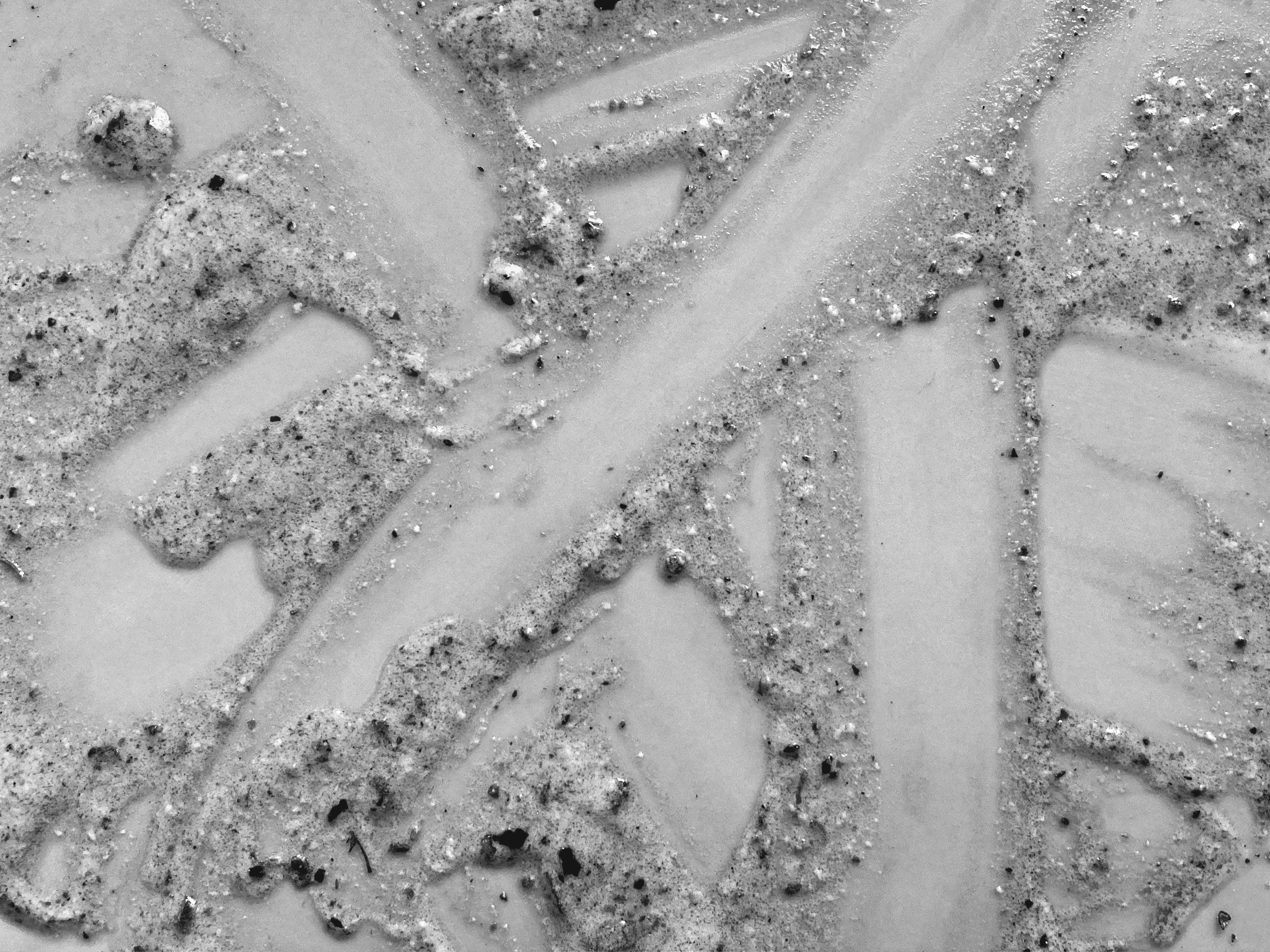 A Black and White Stacked plates showing different textures and edge details